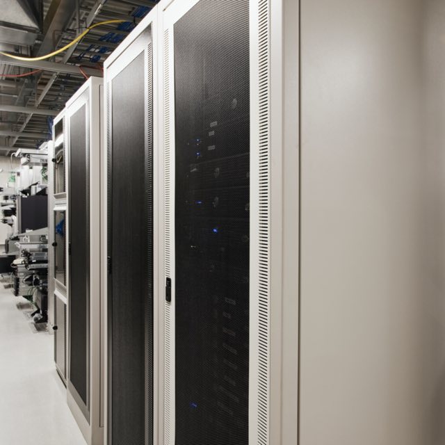 Computer servers mounted in a cabinet